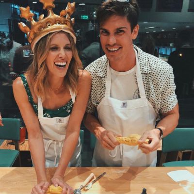 Photo of Tanner Novlan and his wife, Kayla Ewell while making pasta.